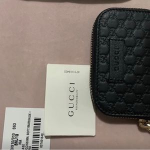Gucci coin purse.